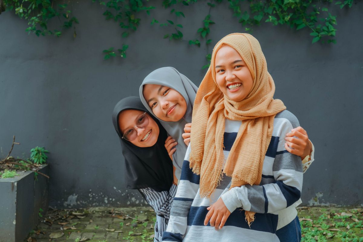 A group of women embracing in solidarity
